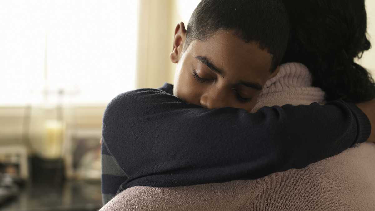 My husband kicked us out — Then I caught my son hugging someone I never expected
