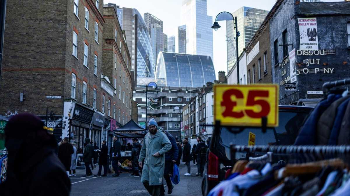 UK inflation dips, easing some pressure on government