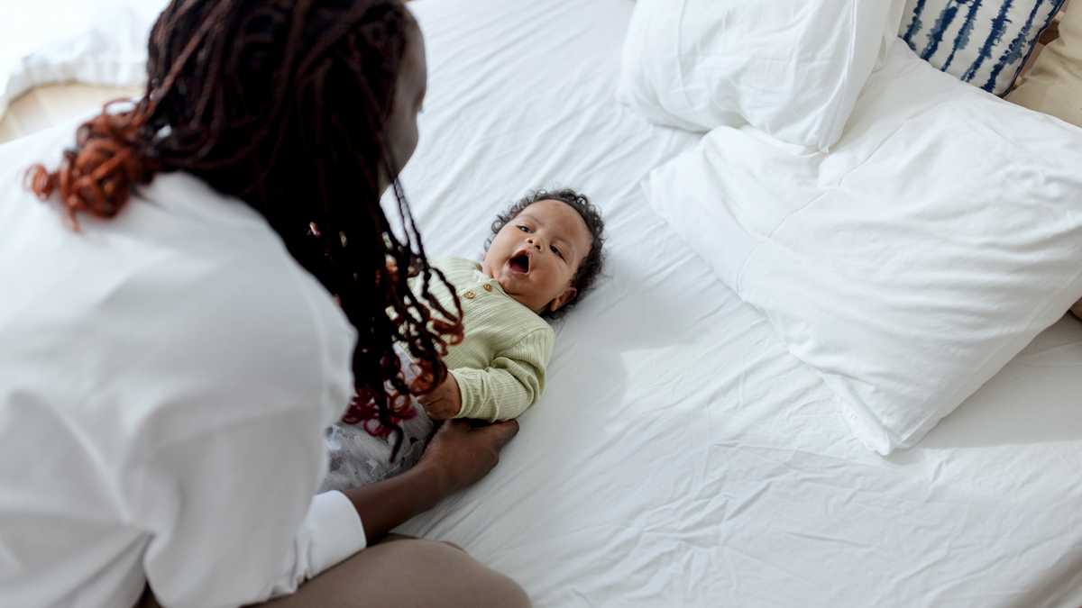 I was on a work trip when I saw a stranger tuck my son into bed—what I found made me seek revenge