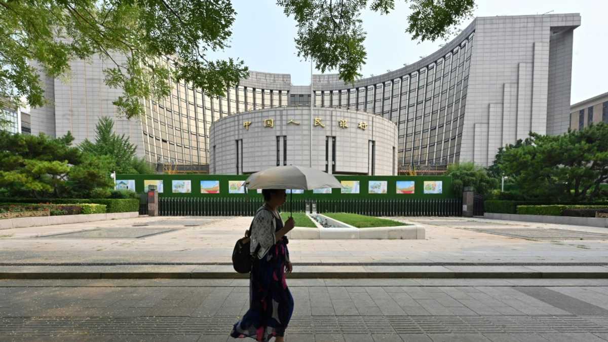 China central bank cuts two key rates to support flagging economy
