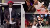 Comedian Cute Abiola sleeps in pile of money as he storms club with wife, friends to celebrate birthday