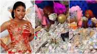 TikTok star Beauty Goddess swims in pool of cash that she was sprayed on birthday, video trends online