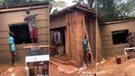 "Stop waiting for millions": Nigerian man builds portable house with small money, plasters wall with cement