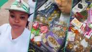 "Should we tell her?" Female corper packs carton of malt, sardines, milk, to NYSC camp, video trends