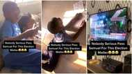 "He is very serious about it": Nigerian boy watches television to monitor results of presidential elections