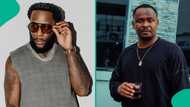 Burna Boy and Zubby Michael's unusual handshake at Jowizaza's party draws reactions