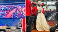 Lady who returned from UK dresses in wedding gown to Nigerian church with hopes of getting husband