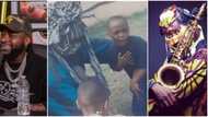 "See how innocent he looks": Fans react as photos of 5-year-old Davido playing with veteran Lagbaja goes viral