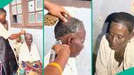 Nigerian man changes his grandma's looks with clipper, makes her "young" again with cute hairstyle