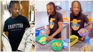 Women and men belong in the kitchen, Naira Marley says as he shares video showing cooking skills