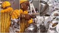 Video captures lady serving ewedu and gbegiri with kettles, Nigerians give mixed reactions