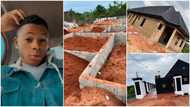 Young man builds house, installs black roof and gate, interlocks compound to achieve great decor