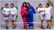 Beautiful Nigerian twins who got pregnant show off their baby bumps in cute video, wearing colourful gowns