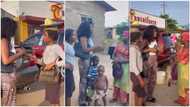 Lady begs for N50 from girl hawking on street, rewards her, follows kid home & pays mother's rent in clip