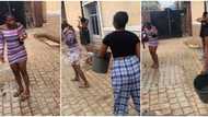 "See wetin you wear": Lady disgraces sister for dressing up for church in short cloth, pours water on her