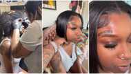 Lady tattoos name of her Nigerian Twitter crush on her face, video of her receiving the ink stirs reactions