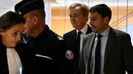 French luxury mogul Arnault defiant at ex-spy chief trial