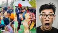 Video captures moment groom abandoned his bride to chase people stealing money sprayed on her, stirs reactions