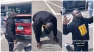 Happy man kneels to give praise after successfully relocating to United States in touching video
