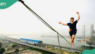 “He wants to break new global record”: Man walks on rope across bridge in Lagos, video trends