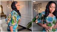 Trending video of lady in tight ankara dress leaves netizens concerned: "Please breathe small"