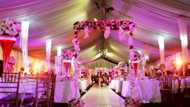 Reactions as female videographer covering wedding ceremony in church ordered to tie wrapper on her trousers