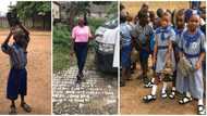 Young Nigerian lady gifts shoes to poor 7-year-old boy who wears nylon-tied sandals to school