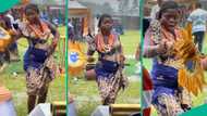 Bride dances during rainfall, doesn't allow anything to spoil her joy, Nigerians praise her