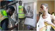 Imole: Nigerian man paints Mohbad's photo on street wall, honours KPK singer with his talent