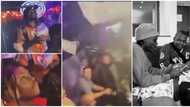 Cash rains as Olamide and Fireboy shut down club in US, video stirs reactions as Oyinbos watch