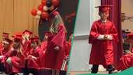 Young boy in his graduation gown tells crowd he wants to be like his father when he grows up