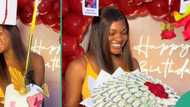Crowd screams in excitement as lady finds iPhone in flower gift on her birthday
