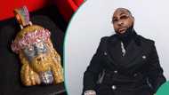 Davido splashes millions of naira on Jesus pendant, flaunts it during Timeless concert at O2 Arena