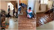 Nigerian lady rents house with tiles, lays carpets over them, her interior decor choice stirs reactions