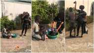 Lady delays hawker to test boy's character, buys all his bottles of liquid soap as reward, he hugs her in clip