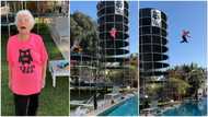 Grandma climbs tall platform, 'jumps' inside pool in video, many people react