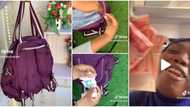 "I need to invest it": Nigerian lady flaunts foreign currencies she found in her okrika bag, video causes stir