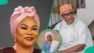 Sola Shobowale kneels to greet Adebayo Salami and wife at media hub launch