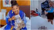 Actress Mercy Aigbe moved to tears after friend surprised her with several bundles of cash as birthday gift