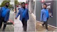 "U carry this shoe": Sabinus lands in London, walks around in his blue shirt, black trousers, video wows fans