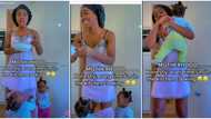 "They want to go back in": Twin babies almost naked their mum as they pull down her dress in live TikTok video