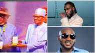 Burna Boy's dad receives MFR award from Buhari on son's behalf, 2Baba bags MON award, video trends, fans react