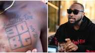 Fan tattoos Davido's soon-to-be-released album ABT on his chest (video)