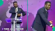 Video: Nigerian pastor takes out pack of cigarettes from his suit to demonstrate during preaching