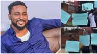 Una papa no get work: Reactions as some of Pere's fans carry placards in protest as they try to locate Biggie