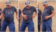 Handsome young man With pot-belly dances in public, rolls his stomach accurately in stunning video