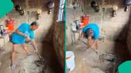 Nigerian lady plasters full kitchen floor herself after mixing cement, video trends