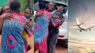 8 years after, lady who moved abroad when she was single returns with 3 kids, her family celebrates