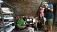 Far from home, Russian exiles help Ukrainian refugees