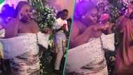 Lady adorns awkward dress at a party, dances excitedly, netizens react: "She's not even ashamed"